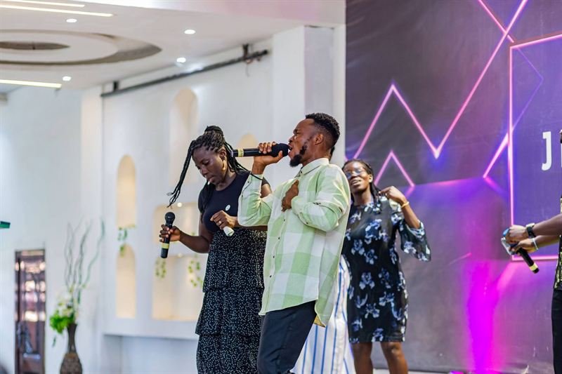 The KMC choir ministering during a gathering